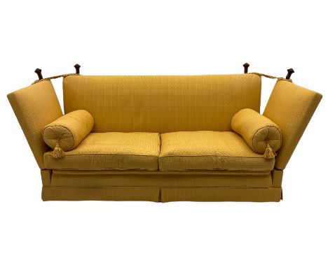 Peter Silk of Helmsley - Knole style grande sofa, drop arms with mahogany finials, upholstered in pale gold fabric, with balu