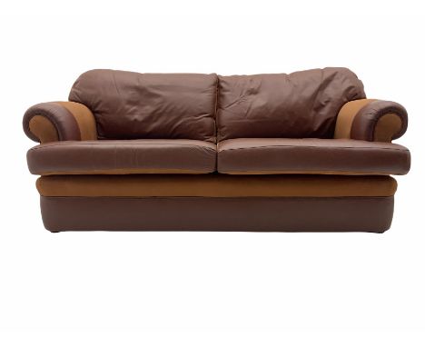 Peter Silk of Helmsley two seat sofa, upholstered in brown leather and fabric, feather back cushions, reversible cushion opti