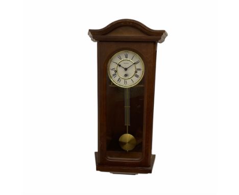 A 20th century  Westminster chime, spring driven three train �William Widdop� wall clock with a visible gridiron pendulum, ch