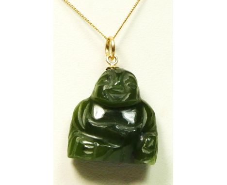 A 14K gold mounted carved nephrite jade buddha pendant, 9ct gold chain. 