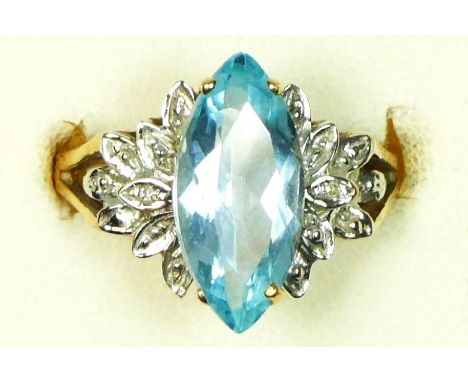 A 9ct gold blue topaz and diamond dress ring, 16 x 7mm, N, 3.1gm 