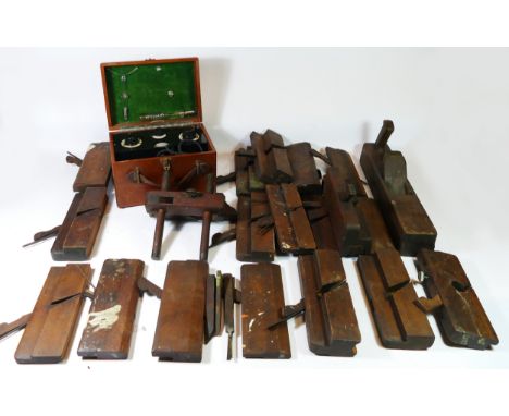 A collection of 19th century moulding planes, box planes, together with a sash fillister plane and a cased vitalator volt tes