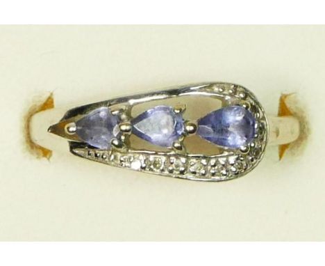 A 9ct white gold tanzanite and diamond dress ring, N, 2.3gm 