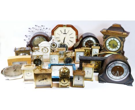 A collection of carriage clocks, wall clocks and alarm clocks, having manual wind and quartz movements. (4) 