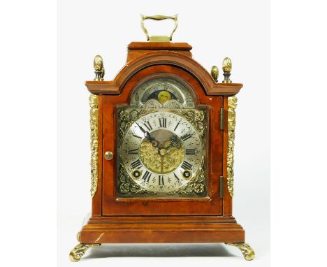 A burr walnut & gilt brass bracket clock, having sun & moon dial, with manual wind movement striking on bell. 22cm tall. Ther