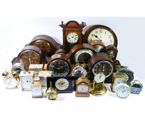 A collection of carriage clocks, anniversary clocks and mantel clocks, having manual wind and quartz movements.(4) 