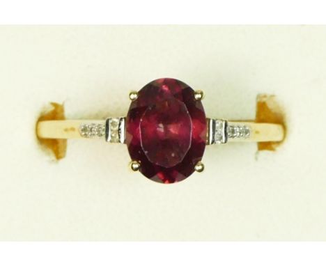 A 9ct gold single stone garnet ring, diamond set shoulders, S, 2.4gm 