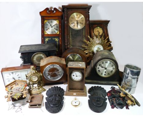 A collection of mid 20th century mantel and wall clocks, manual wind and quartz movements for spares or repair. (4) 