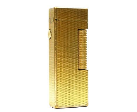 Dunhill, a gold plated Rollagas lighter, with engine turned decoration. 