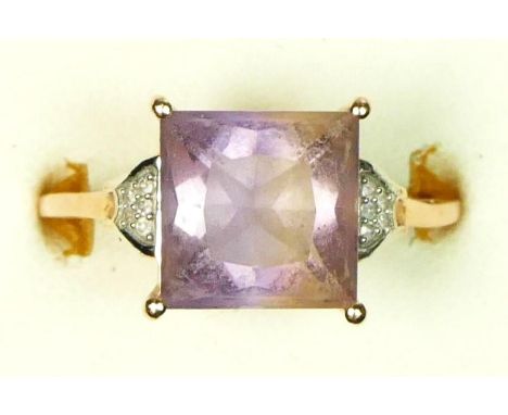 A 9ct rose gold amethyst single stone ring, diamond set shoulders, S, 2.9gm 