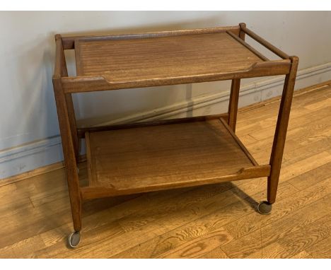 A mid 20th century tea trolley, tray over lower shelf, tapered legs, on Kenrick Mini Meteor castors, 71cm x 60cm x 42cm 