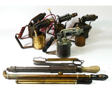 Six early 20th century brass &amp; copper paraffin blow torches (one converted to a lamp) together with three early brass han