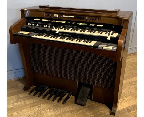 A Hammond T-524 electric organ, with built in tape deck, 111cm x 100cm x 63cm, together with a Hammond Leslie Model 350 speak