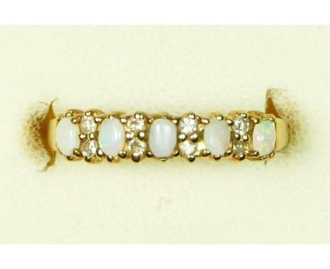 A 9ct gold five stone opal ring with brilliant cut diamonds between, L, 1.4gm 