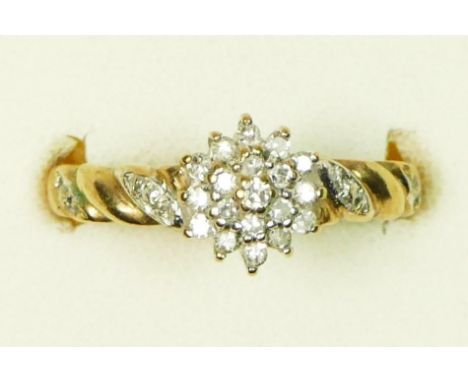 A 9ct gold and diamond cluster ring, stated weight 0.25cts, O, 2.4gm 