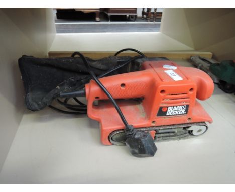 A Black and Decker belt sander