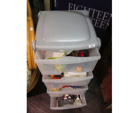 A set of plastic drawers containing tools and accessories etc