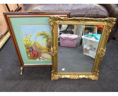 A modern tapestry fire screen and gilt wall mirror