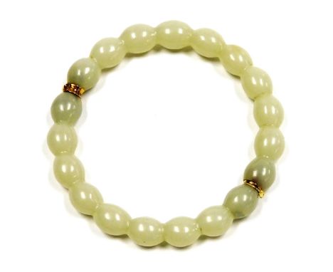 A pale jade bangle, on a yellow metal snap clasp, 25.5g. 