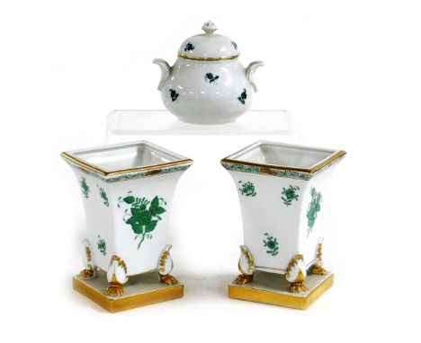 A pair of Herend porcelain vases, of trumpet form, raised on four paw feet and a square base, decorated in green and gilt wit