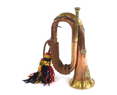 A copper and brass military bugle, with the Army Cyclist Corps to the front, stamped to the side, Cyclist Corps with crows fo