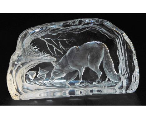 A Dartington Crystal Intaglio paperweight, designed by Alfred Capredoni, showing a fox and her cubs, etched mark, 16.5cm wide