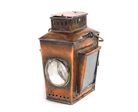 A Victorian copper safety lamp, with swing handle, 19.5cm high.
