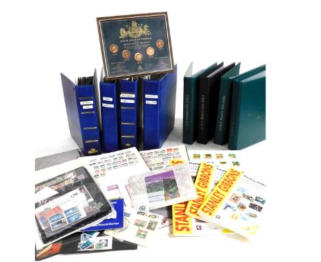 Philately. World stamps, commemoratives and definitives, mint and used, together with first day covers, and a Royal House of 