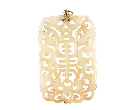 A Chinese white jade pendant, with pierced and scrolling detailing, on a yellow metal mount, 7cm x4.5cm.