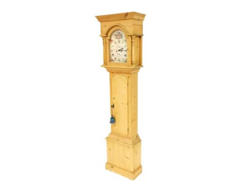 A replica effect pine longcase clock, with break arch dial, the door opening to reveal two shelves, raised on a plinth base, 