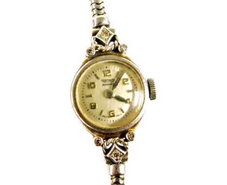 A Rotary Maximus 9ct white gold and diamond set cocktail watch, circular silvered dial bearing Arabic numerals at evens, jewe