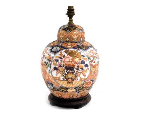 A Chinese Republic porcelain ovoid jar and cover, fitted as a lamp, decorated in the imari palette, 36cm high.