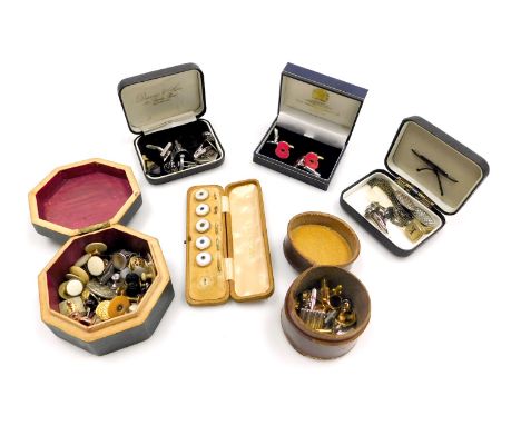 A group of gentleman's silver and costume cuff links, a set of five gold plated and mother of pearl buttons, collar studs, et