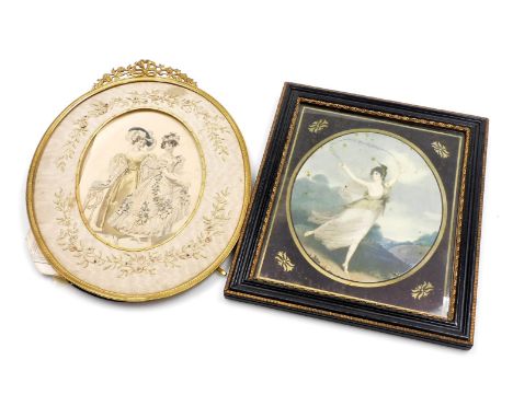A Victorian gilt metal oval frame, with easel back and delicate ribbon and flower pierced crest, with a silk embroidered inne
