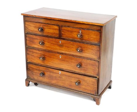 A late Georgian mahogany chest, of two short over three long graduated drawers, raised on bracket feet, 107cm high, 113.5cm w