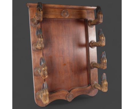 TAXIDERMY - a Deer Hoof Coat / Gun Rack. A large oak panel with eight large red deer hoof slots, originally prepared as a gun