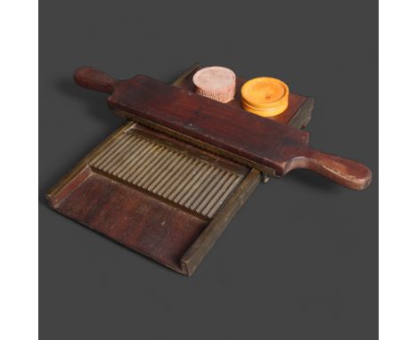 An antique apothecary pill roller, unmarked, with wooden dish and terracotta pot with lid.