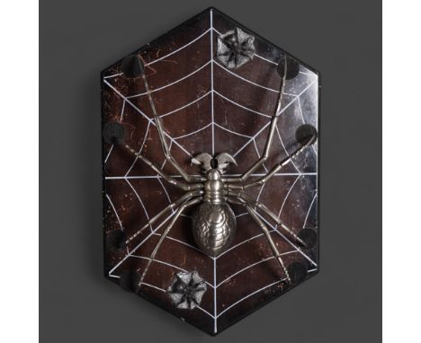 Curiosity/Macabre: a macabre model of a large wall hanging metal spider on web design base, length 44cm.