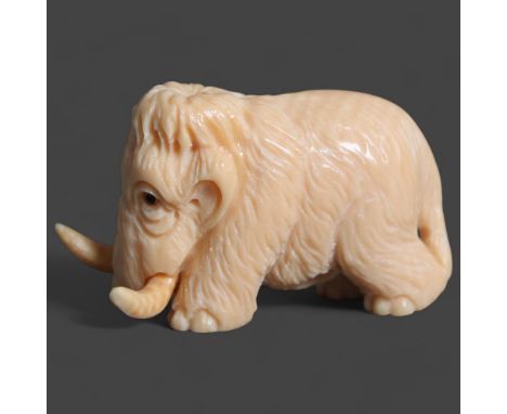 Netsuke: Mammoth carved from Mammoth tusk ivory superb miniature carving of a mammoth hand carved from ~15,000 year old mammo