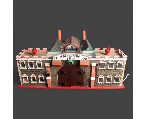Curiosity/Macabre : A vintage scratch built prison, including electrical fittings, width 67cm.