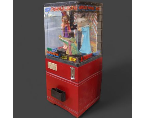 Curiosity/Macabre: A vintage Punch & Judy coin operated arcade game, 142cm x 58cm x 54cm.Operates using 20 pence piece. In wo