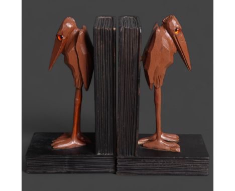 Pair of Art Deco Bookends in the form of Marabou Storks on books A unique pair of hand carved wooden bookends. Each one havin