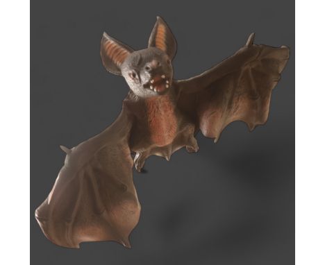 A large hanging vinyl model of a bat.