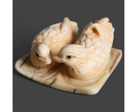 Netsuke: pair of hens, carved from Mammoth tusk ivoryExquisitely carved from this ~15,000 year old material from the extinct 