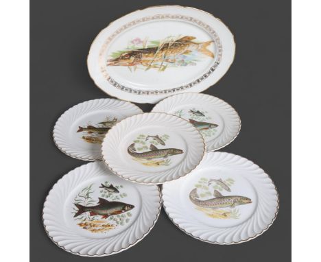 Luneville, a group of 12 ceramic dinner plates and an oval meat plate, all with decorative fish designs, oval plate is 40cm i