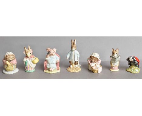 Seventeen Beatrix Potter figures, ten Beswick, three Royal Doulton and four Royal Albert (one tray)