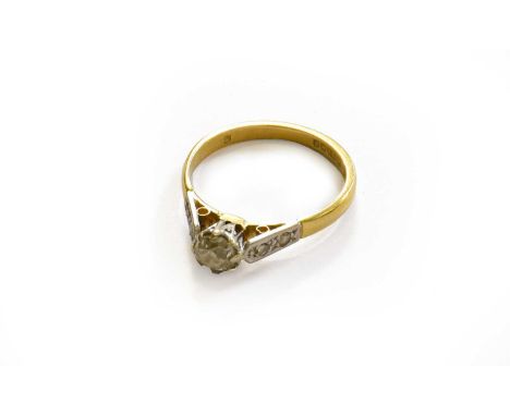 An 18 carat gold diamond solitaire ring, finger size KThe ring is in fair condition. It is hallmarked with maker's mark 'FC?'
