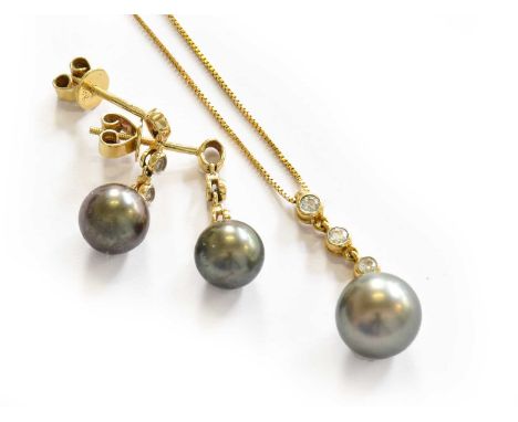 An 18 carat gold cultured pearl and diamond pendant on an 18 carat gold chain, pendant length 2.6cm, chain length 47.5cm; and