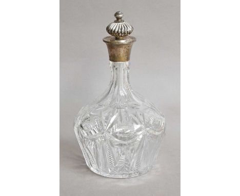 A cut glass silver topped decanter by Barker Brothers Silver Ltd, Birmingham, 1964 (associated stopper); together with three 