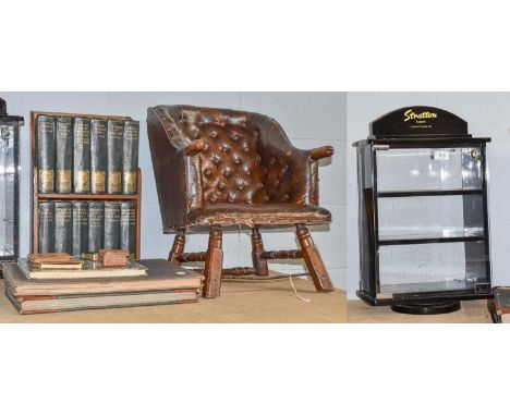 A Stratton advertising shop display cabinet, Gresham library of knowledge in bookcase, a child's button back tub chair and a 